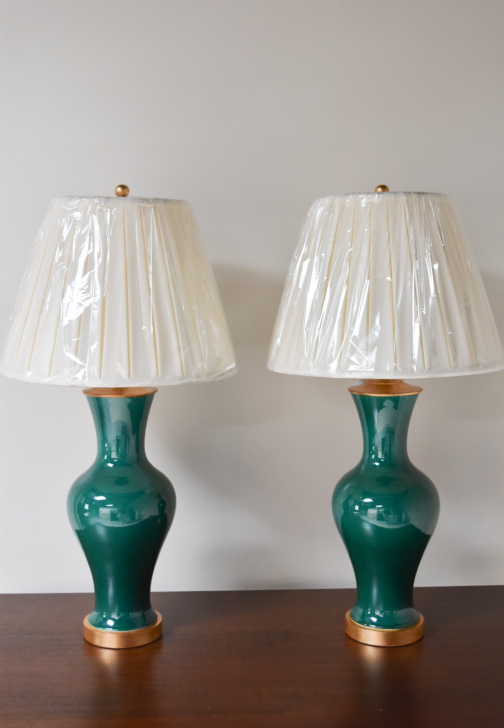 Pair of Emerald Vase Lamps with Gold Leaf Bases