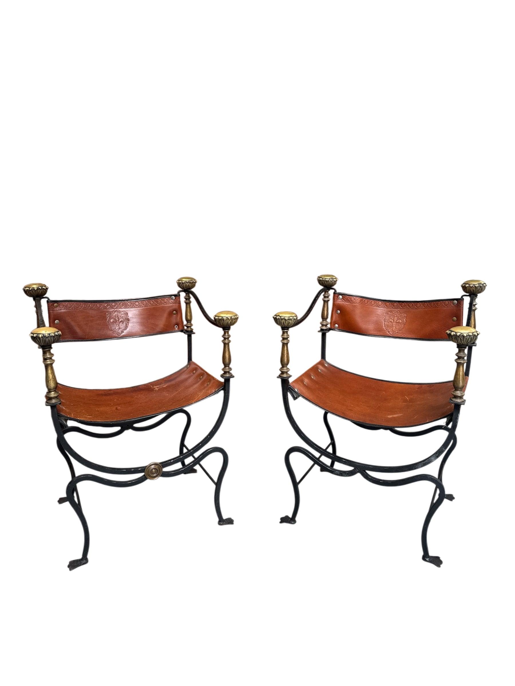 Pair of Black Iron and Brown Leather Curule Chairs with Crest