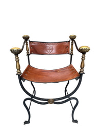 Pair of Black Iron and Brown Leather Curule Chairs with Crest