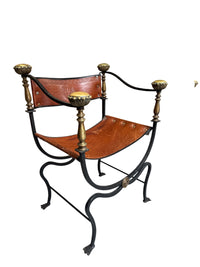 Pair of Black Iron and Brown Leather Curule Chairs with Crest