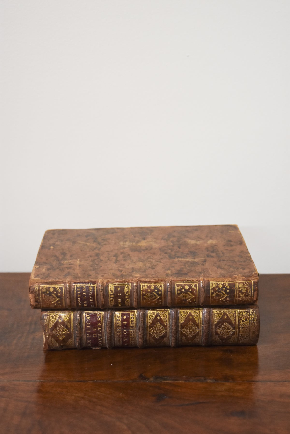 Pair of Antique Leatherback Books Signed "Rolland"