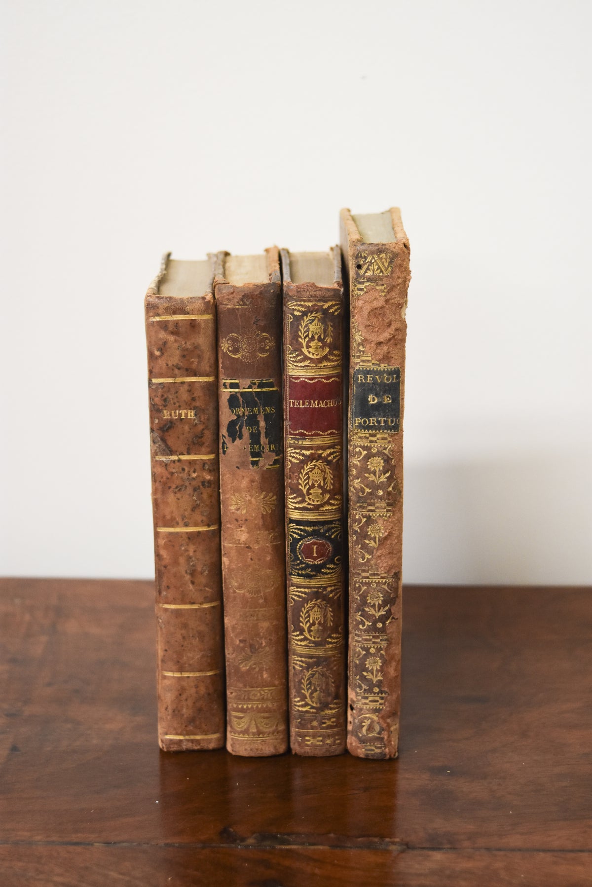 Set of 4 Mixed Antique Leatherback Books
