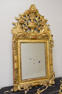 Early 18th Century French Giltwood Mirror with Fronton