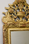 Early 18th Century French Giltwood Mirror with Fronton